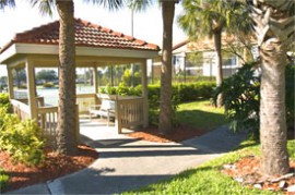 Outdoor amenities at Vintage Grand include tennis courts, resort style pools and a community fishing dock.